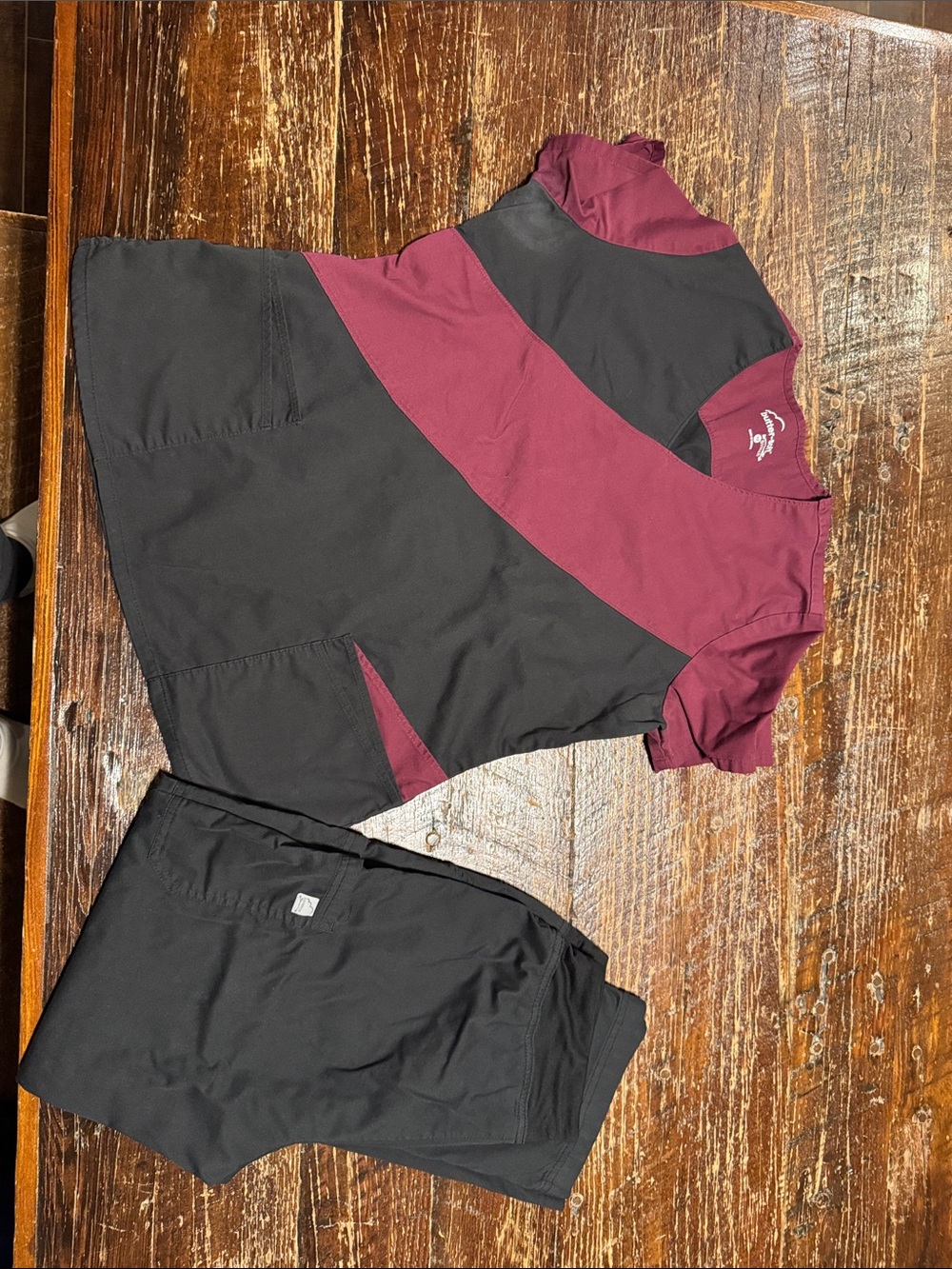 Womenโs Two-Tone Maroon and Black Short Sleeve Mock Wrap Top